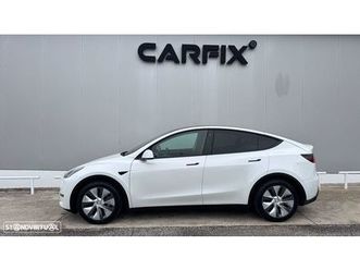 tesla model y long range tração integral