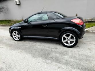 opel tigra 1.4i.80к.+ клима. бензин. 2005г.
