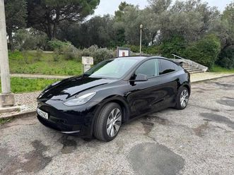 tesla model y standard range rwd, cx. a., 299cv