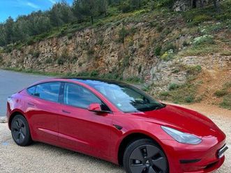 tesla model 3 red