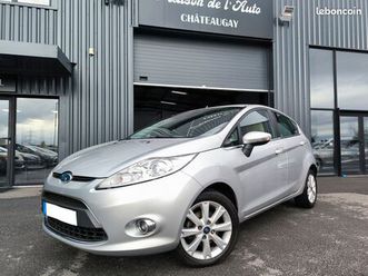 ford fiesta 1.4 tdci 68cv / ghia - clim auto - régul. vit - radar rec