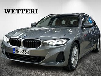 bmw 330 g21 touring 330e xdrive a charged edition / vetokoukku / led-valot - widescreen display / konjakki-nahat / - / rattivaihteet / merkkiliikkeen huoltohist