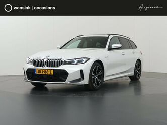bmw 3-serie touring 330e | panoramadak | elek. sportstoelen met geheugen | hud | camera | apple carplay/android auto | adaptieve cruise control | comfort pakket