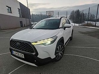 toyota corolla cross 2.0 style hibrid hev awd