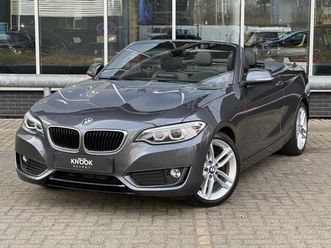 bmw 2-serie cabrio - 228i high executive automaat / navigatie / trekhaak / leder / xenon / regensensor / multif