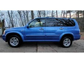 great deal on a low low mile*4x4*v6*suzuki*xl-7*suv*immaculate*1st
