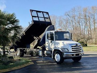 used 2015 hino 358 22-foot flat deck truck with dump function and amco veba crane