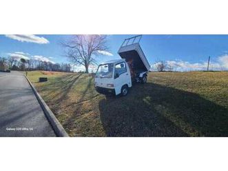 sold #42 1995 subaru sambar 4x4,dump, extra low gear.