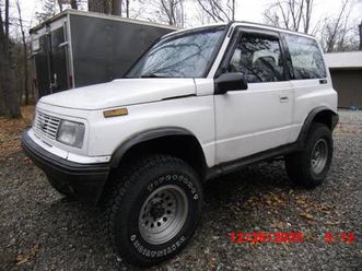 1995 geo tracker tin top 4x4 2 dr hrdtop