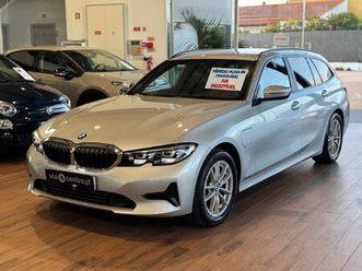 320e touring corporate edition auto.