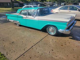 1959 ford galaxie 4 door clean and 99 harley soft tail custom