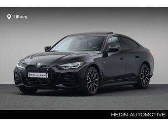 edrive40 high executive 84 kwh | driving assistant professional | elektrisch bediend glazen schuif-/kanteldak |elektrisch verwarmde voorstoelen | bmw laserlight