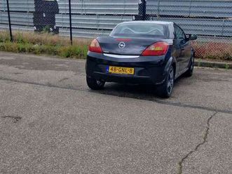 opel tigra 1.4 2008 cabrio zwart met rood leder