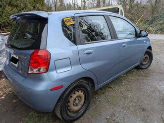 2006 pontiac wave wave 5dr hatchback (gasoline, 1.6l)