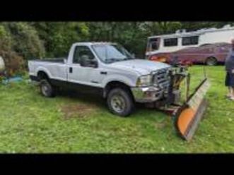 2 plow trucks 2002 f350 7.3 2004 gmc 6.0