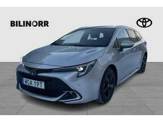 corolla 1,8 hybrid touring sports style