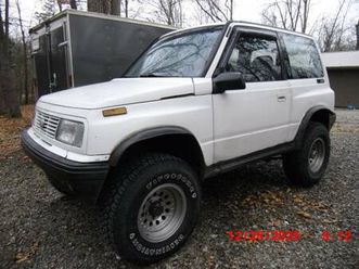 1995 geo tracker 4x4 2 dr hrdtop