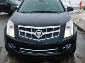 cadillac srx4 2012 awd - vus de luxe, entretenu, pneus inclus!