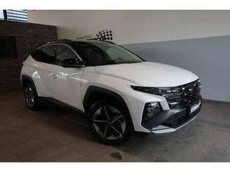 nx4 go plus 1,6 t-gdi hev 4wd at