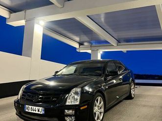 cadillac sts v8 - echange moto