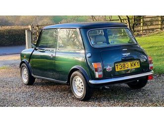 1999 rover mini 1.3 mpi on just 11700 miles from new! a vendre