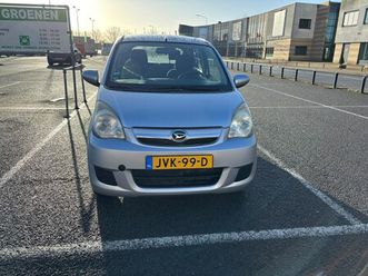 daihatsu cuore - 1.0 premium