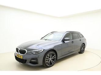 touring 320e business edition plus m sport | leder