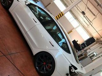 tesla model tre longe range performance