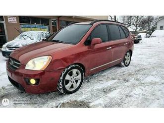 2008 kia rondo ex.. 72k miles.. 3rd row seat.. heated leather..