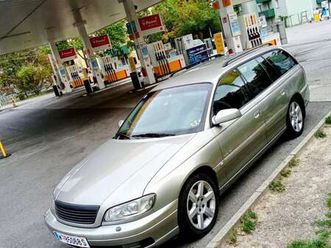 opel omega caravan elegance 2,5 td aut.