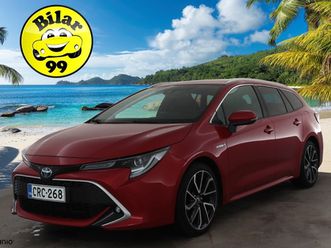 toyota corolla touring sports 2,0 hybrid premium * vakkari / led / p.kamera / puolinahat / jbl / keyless * - merkkihuollettu / kahdet renkaat