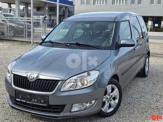skoda roomster 1.6 tdi 66kw 2010.god