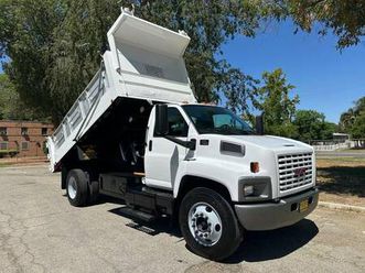 2009 gmc topkick c-7500 dump truck, 15 demo dump body -we finance and natio