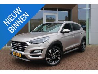hyundai tucson - 1.6 t-gdi 177pk premium automaat leer airco navi camera trekhaak vol dealer onderhouden