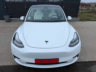 tesla model y standard range rwd summon 320 cp