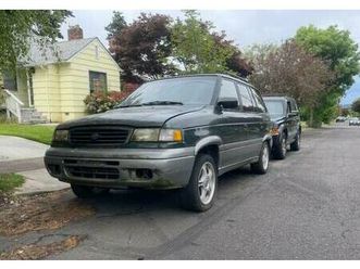 mazda mpv 1997 4wd 4 door has 3rd row seats 7