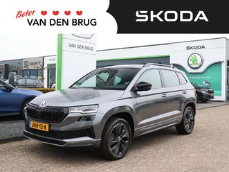 skoda karoq 1.5 tsi 150pk automaat sportline business | trekhaak | matrix led | adaptieve cruise control | achteruitrijcamera | elektrische achterklep |