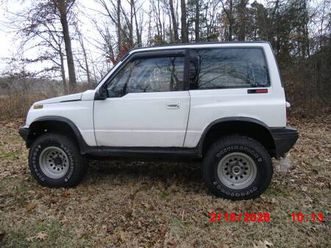 1995 geo tracker tin top 4x4 2 dr hrdtop