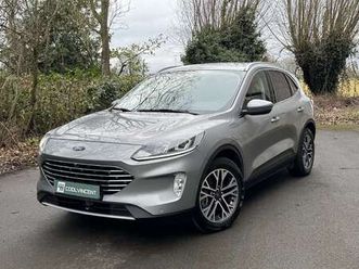 1.5i // plug in hybride // titanium 14.875€ htva