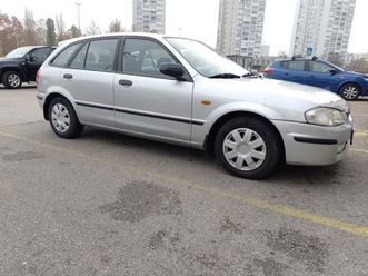 mazda 323f,1.5/65kw reg.8/26,229 tkm.u obitelji od početka