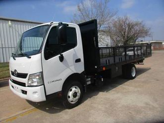 2019 hino 155 with a 18 feet flat bed with stakes