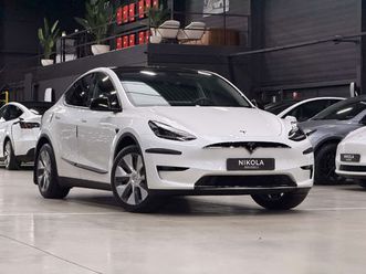 tesla model y rwd - low mileage - highway autopilot