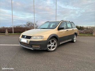 fiat stilo uproad multiwagon cross 1.9 jtd break 115ch - phares auto - jantes alu - capteur de pluie - regulateur de vitesse - radio cd / mp3 - vitres electriqu