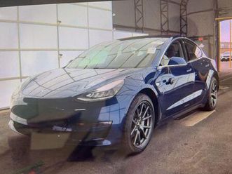 used 2018 tesla model 3 mid range