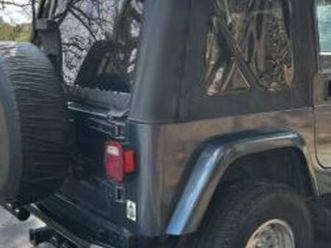 2001 jeep tj sport - 4.ol- new top and shocks