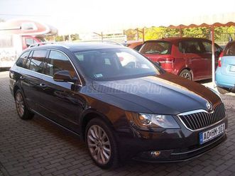 skoda superb combi 2.0 cr tdi elegance 4x4 dsg gyári fényezés. vonóhorog. 4x4. automata. kétzónás digitális klíma . navi. xenon