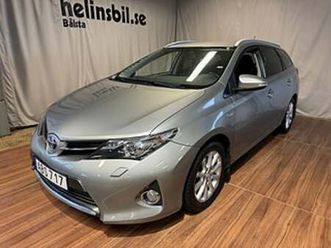 toyota auris 1.8 hsd touring sports