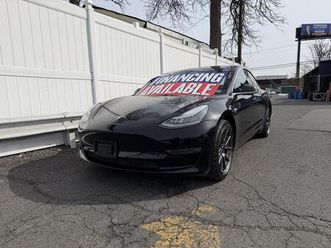 used 2018 tesla model 3 mid range