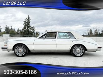 1985 seville bustleback ** 67k miles **tufted leather interior