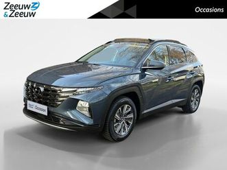 hyundai tucson - 1.6 t-gdi hev comfort | pano dak | stoel verwarming | climate | nav | telefoon |